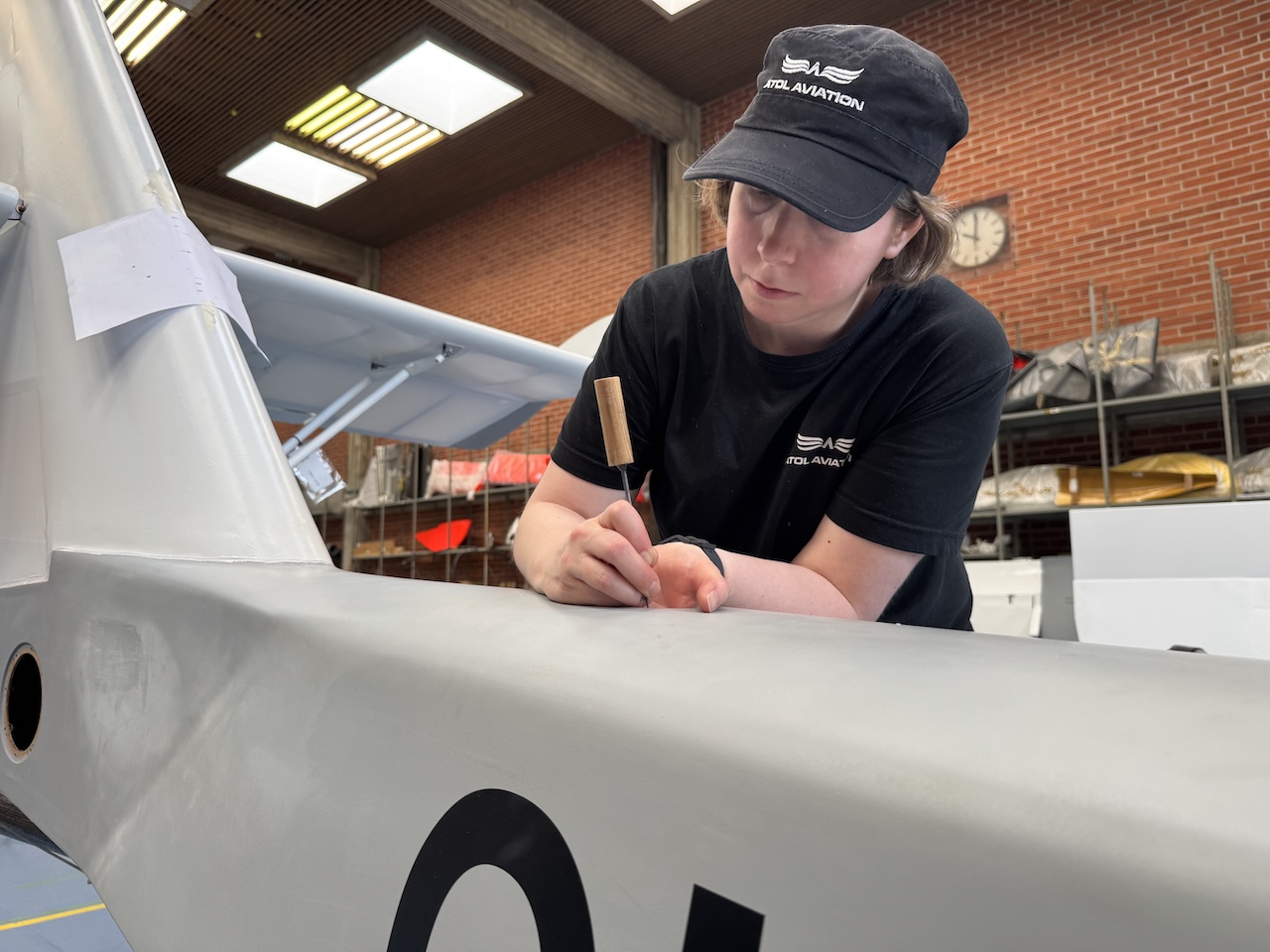 Small detail in fuselage being polished